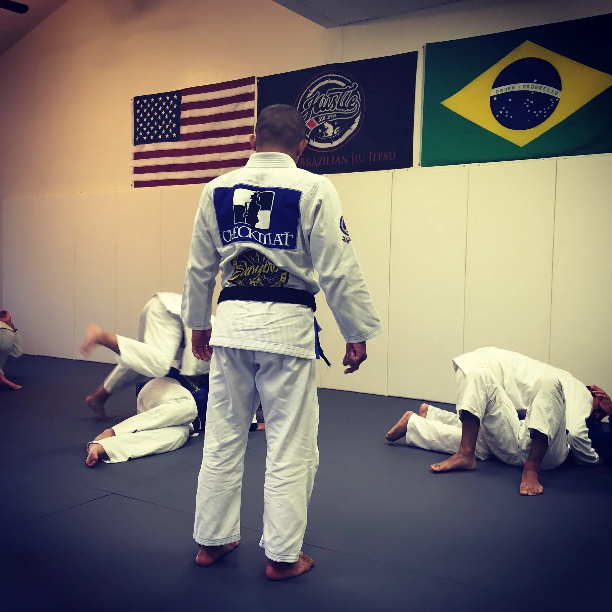 Hustle Brazilian Jiu Jitsu logo