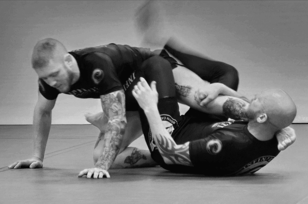 Infiniti Newborn Cascao Jiujitsu logo