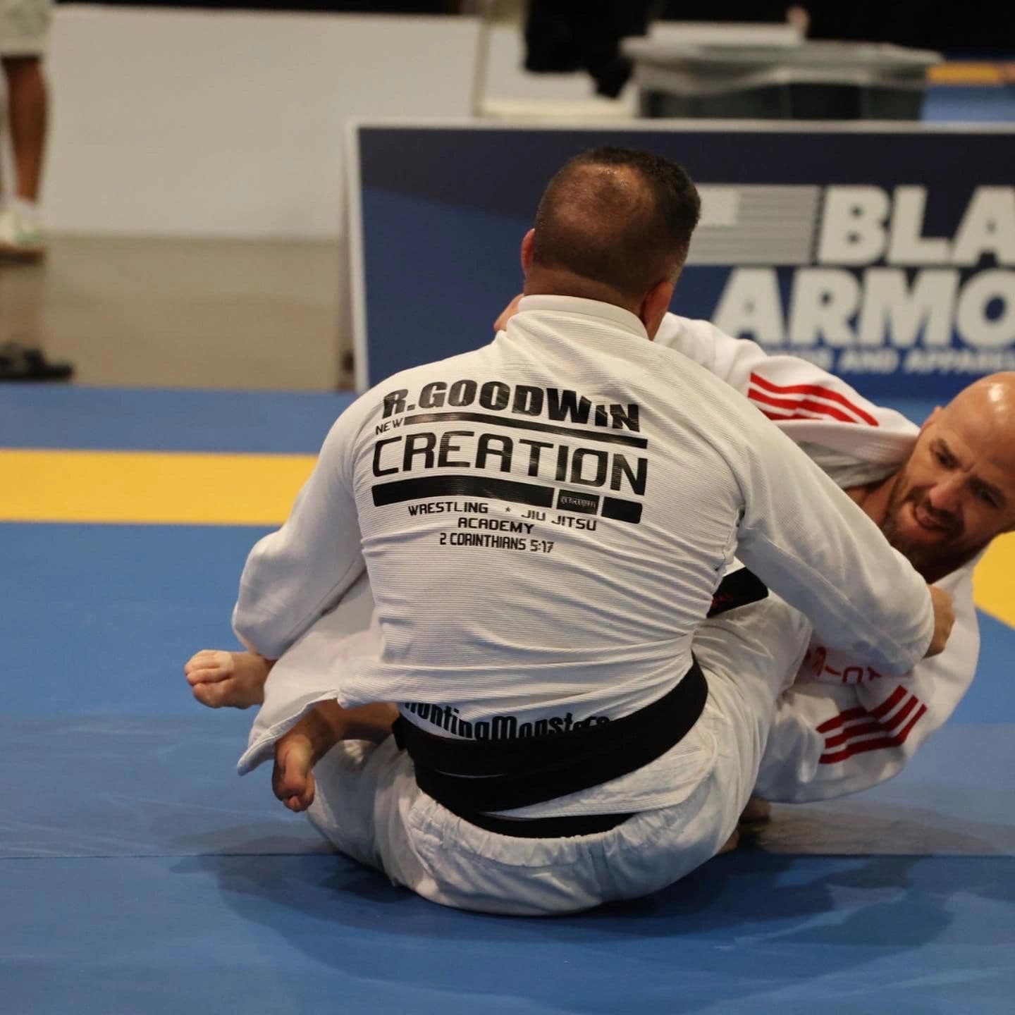New Creation Wrestling and Jiu Jitsu LLC logo
