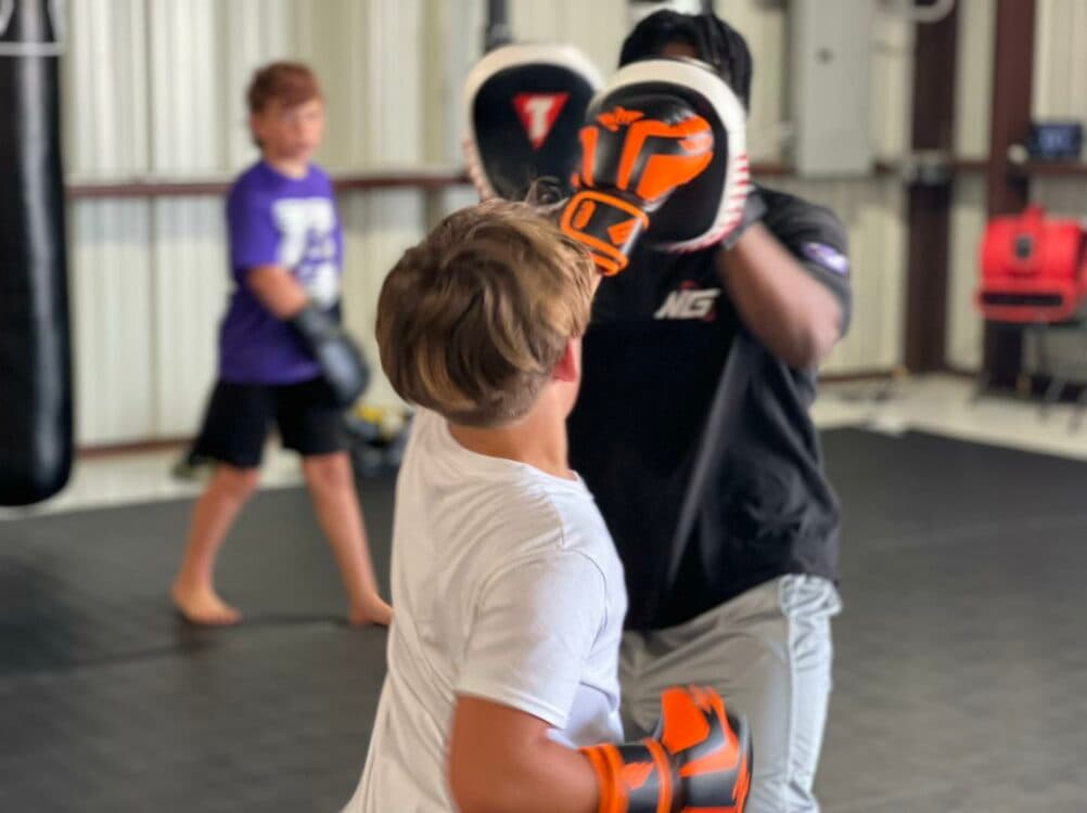 RM Elite Brazilian Jiu Jitsu-Next Generation MMA Van Alstyne logo