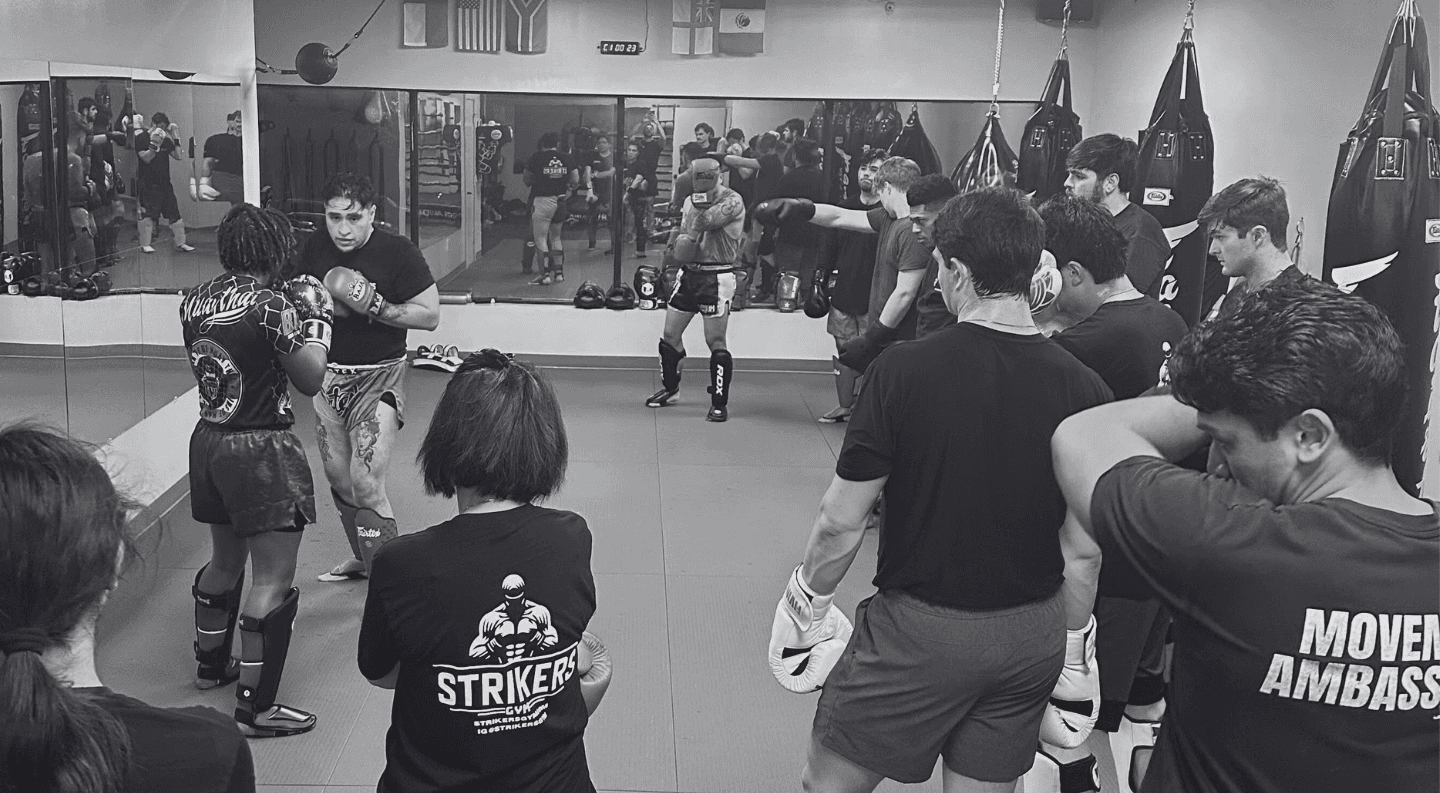 Strikers Gym logo